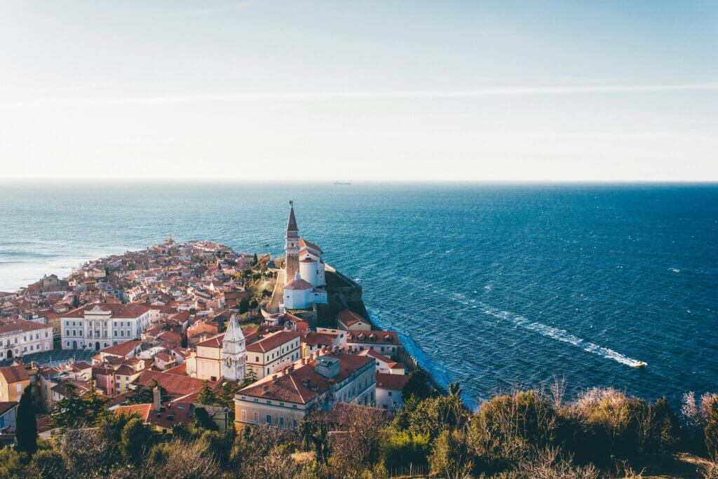 Charming coastal town of Piran, Slovenia, with Venetian-style architecture and Adriatic Sea views.